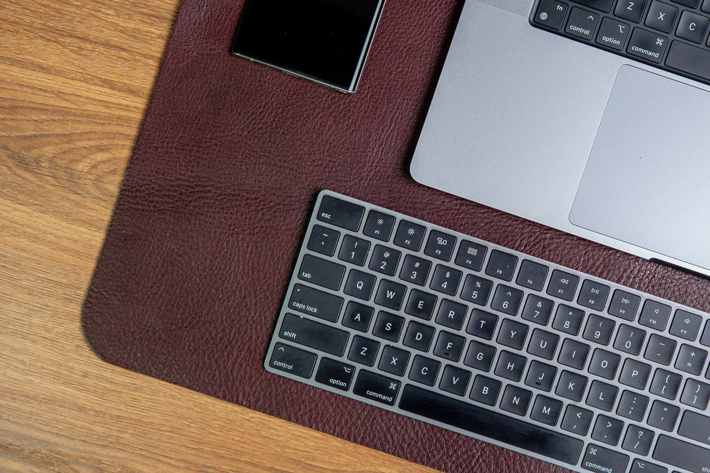 The large desk mat in Australian Nut, composed