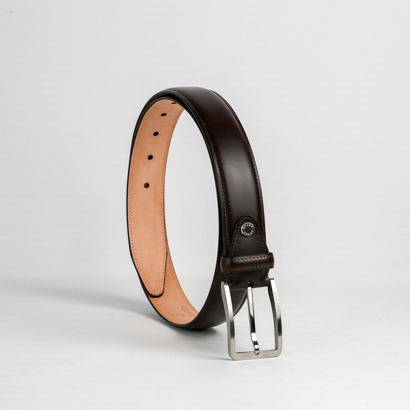 The Lorenzo belt in dark brown Italian vegetable tanned Bridle leather, with its nickel buckle, by James Aston