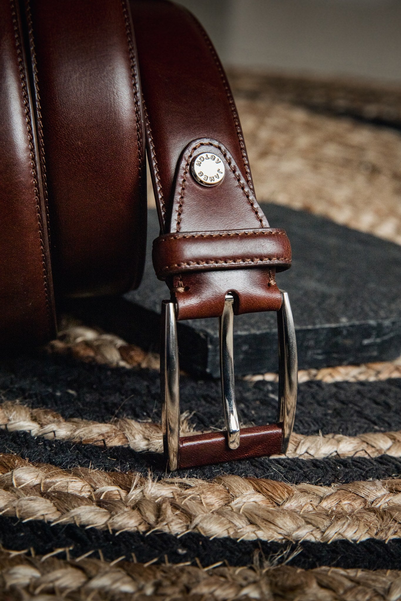 Close view of the Italian Full Grain Vachetta leather of the Federico belt in Australian Nut