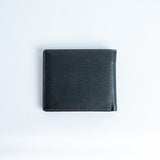 The back of the Alonzo bifold wallet in black milled Vachetta leather.