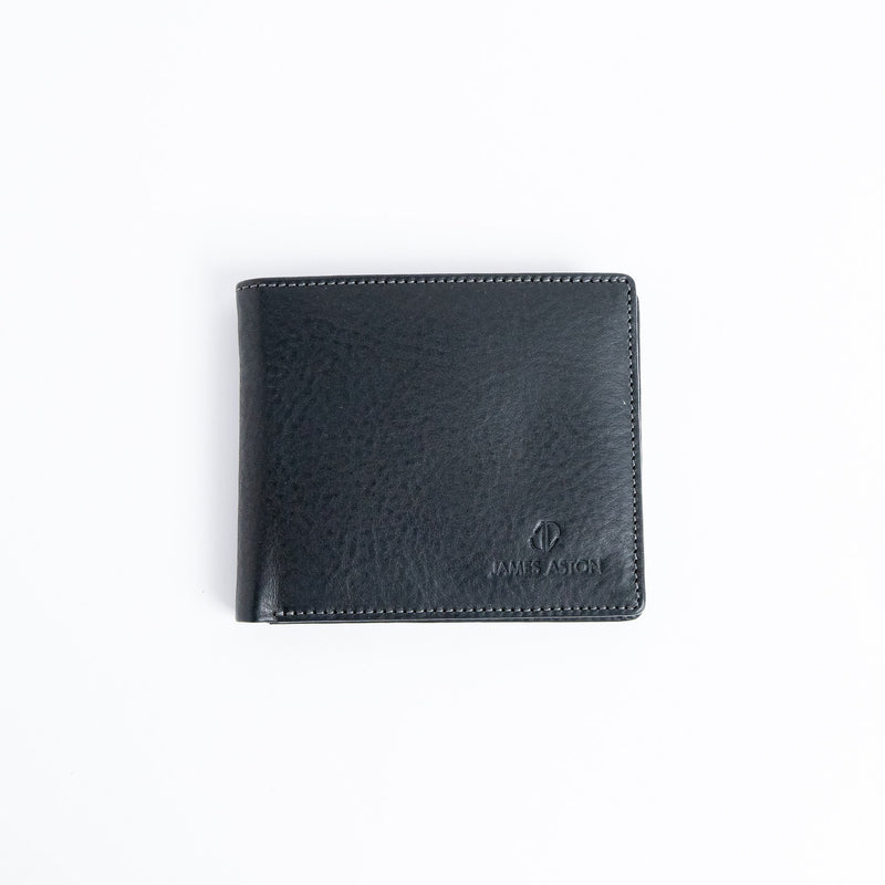The Alonzo bifold wallet in black vegetable tanned milled Vachetta leather, by James Aston