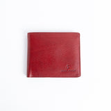 The Alonzo bifold wallet in red milled Vachetta leather, closed.