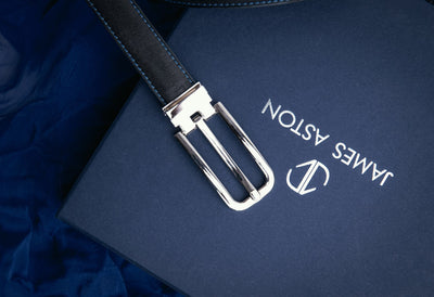 The natural Vachetta leather of the Anna dress belt in blue.
