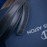 The grain of the Vachetta leather of the Anna dress belt in blue, up close.