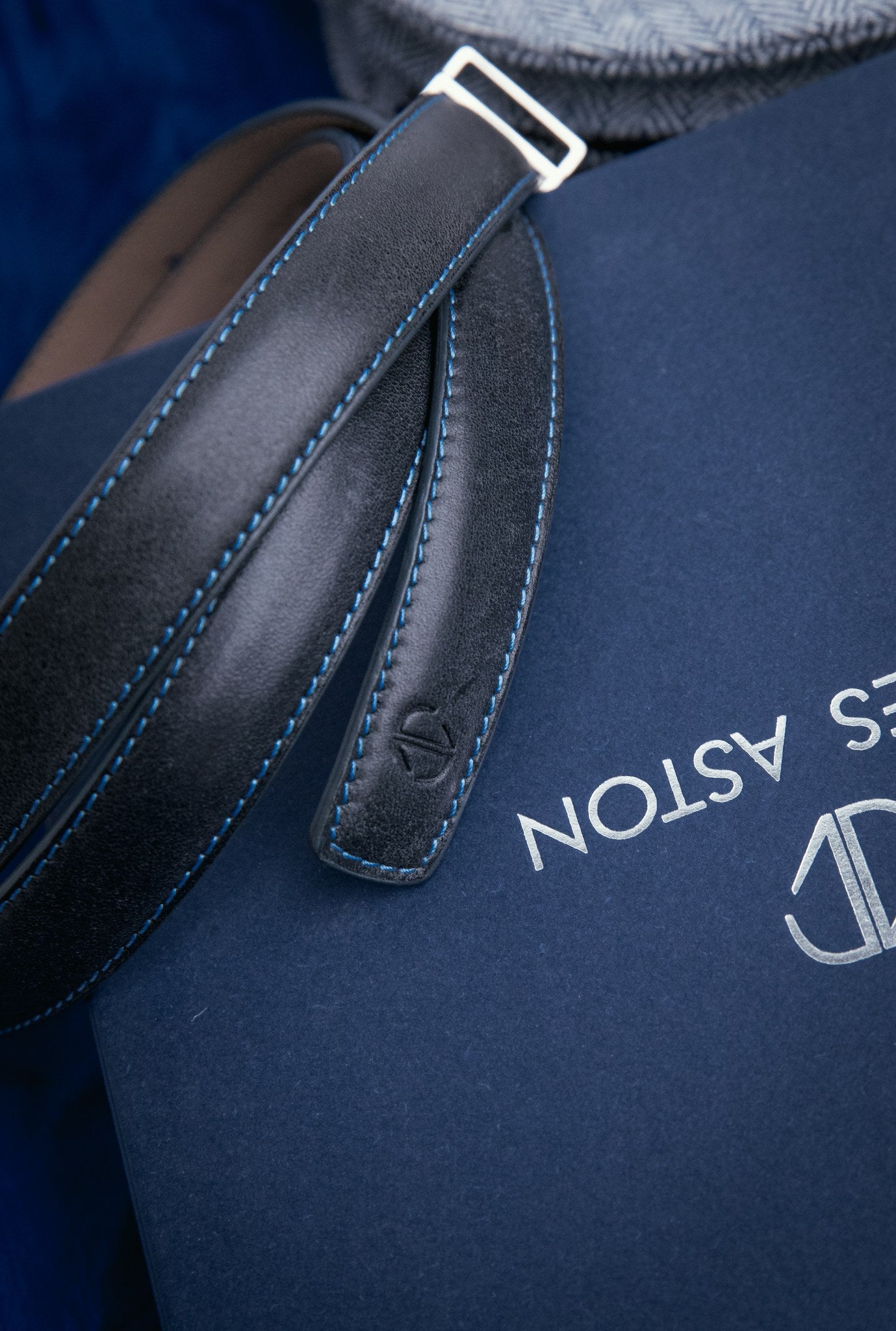 The grain of the Vachetta leather of the Anna dress belt in blue, up close.