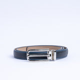 The brushed nickel buckle of the Anna Vachetta dress belt in blue.