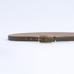 The Anna dress belt in olive Vachetta leather, full length, with gold buckle.