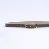 The Anna dress belt in olive Vachetta leather, full length, with gold buckle.