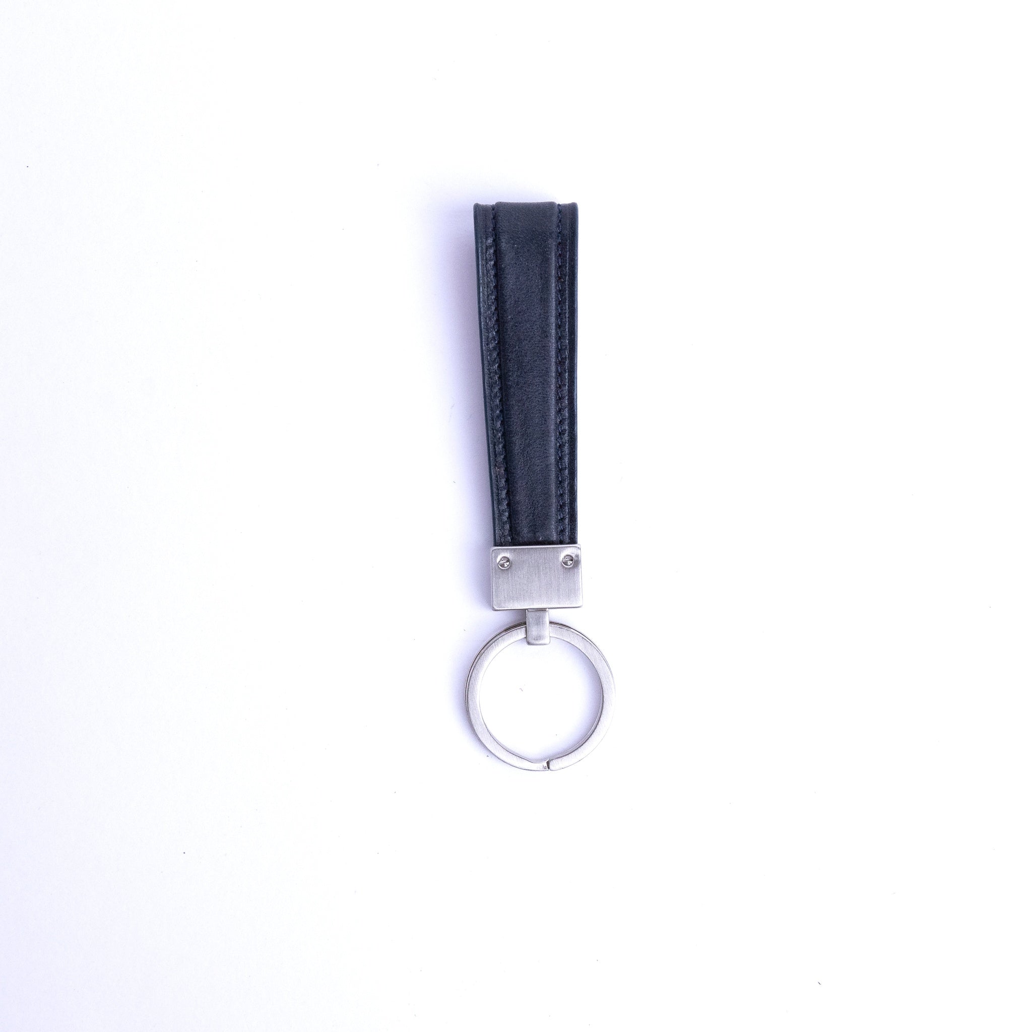 The back of the Armando key holder in black Italian Vachetta leather.