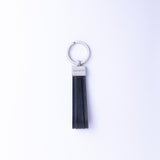 The Armando key holder in black Italian Vachetta leather, with its brushed nickel keyrings.