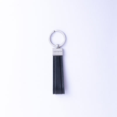 The Armando key holder in black Italian Vachetta leather, with its brushed nickel keyrings.