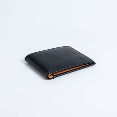 The Bristol bifold wallet in black English Bridle leather.