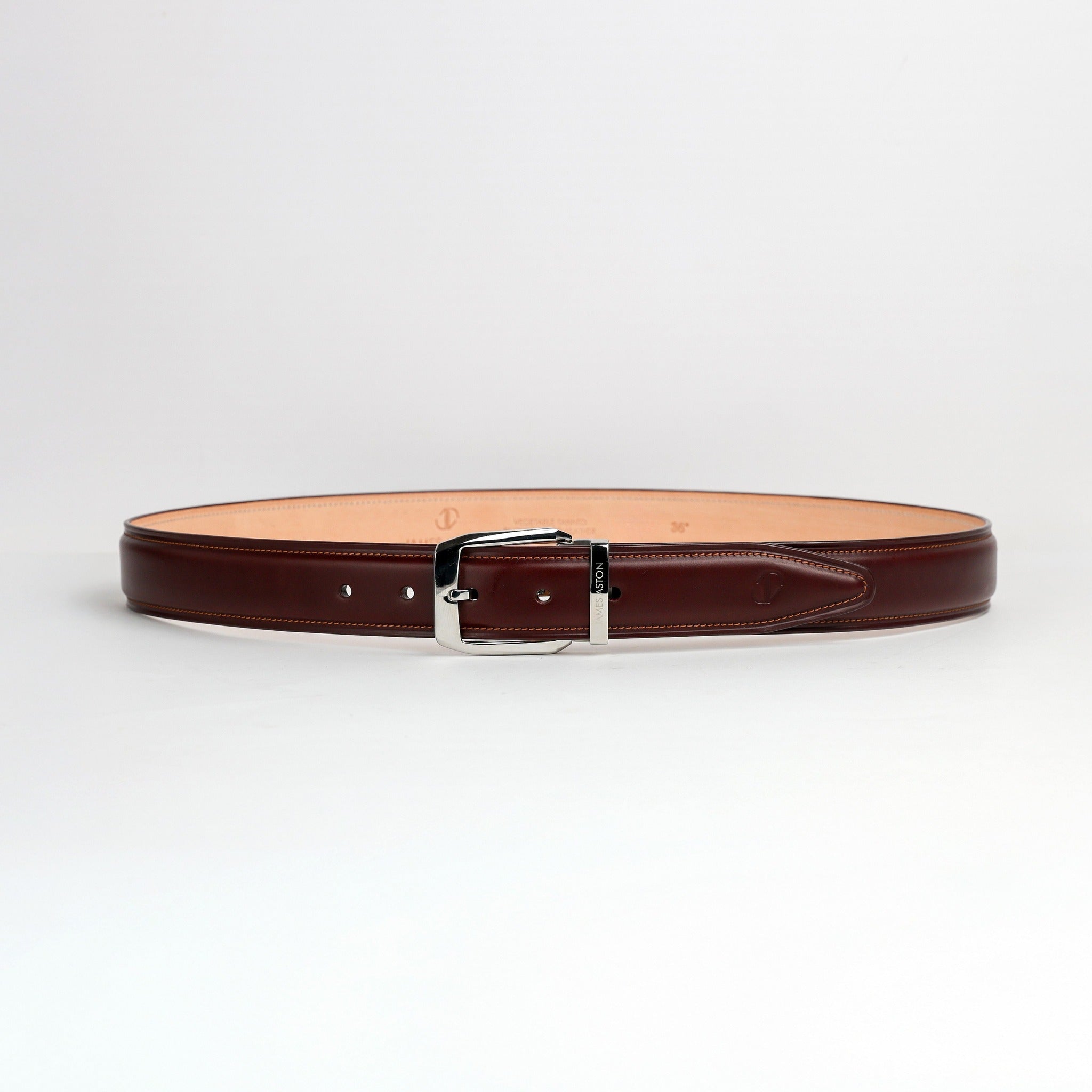 Full length of The Cosimo oak brown Italian Bridle leather belt with palladium buckle, by James Aston