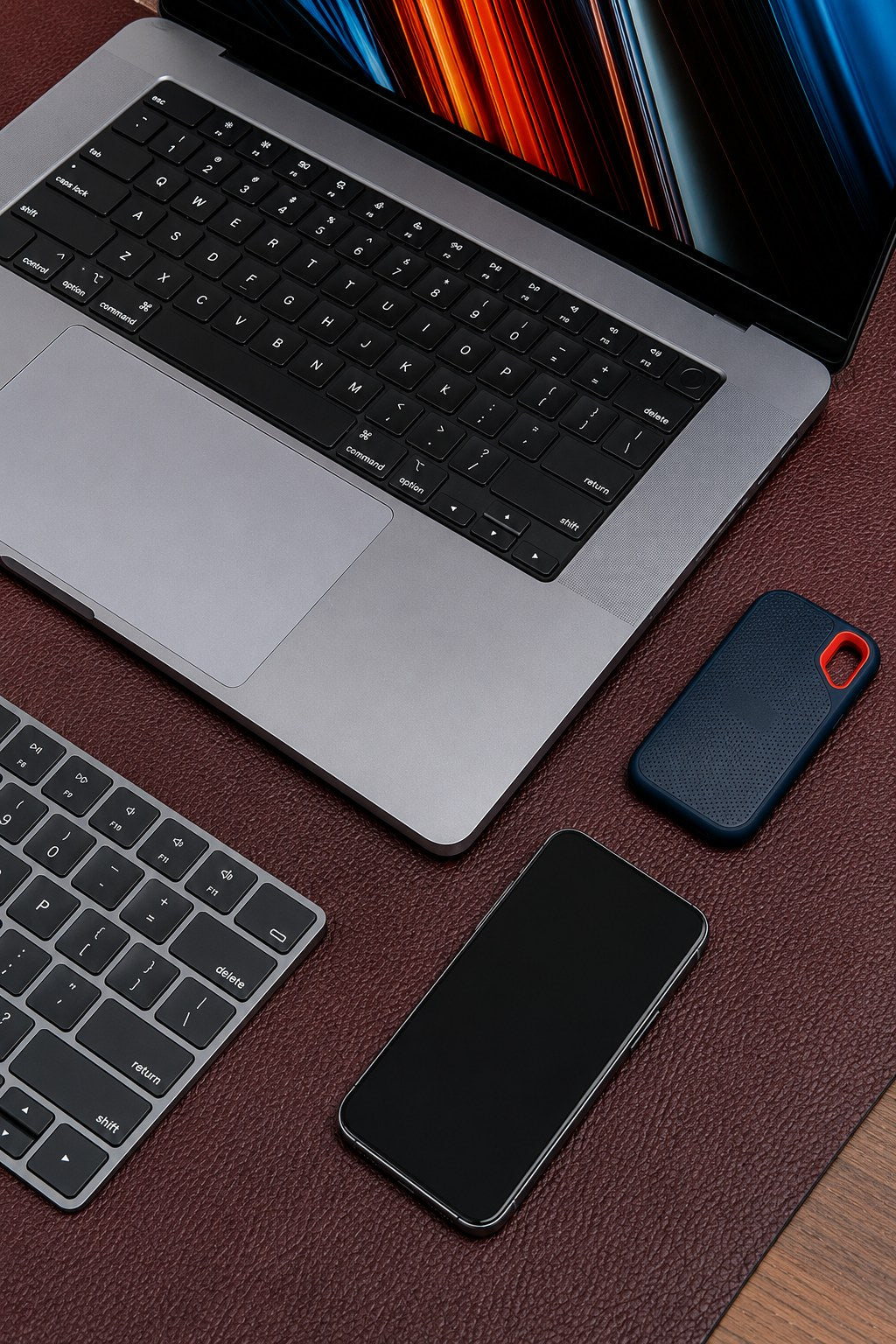 The large desk mat in Australian Nut on a working desk