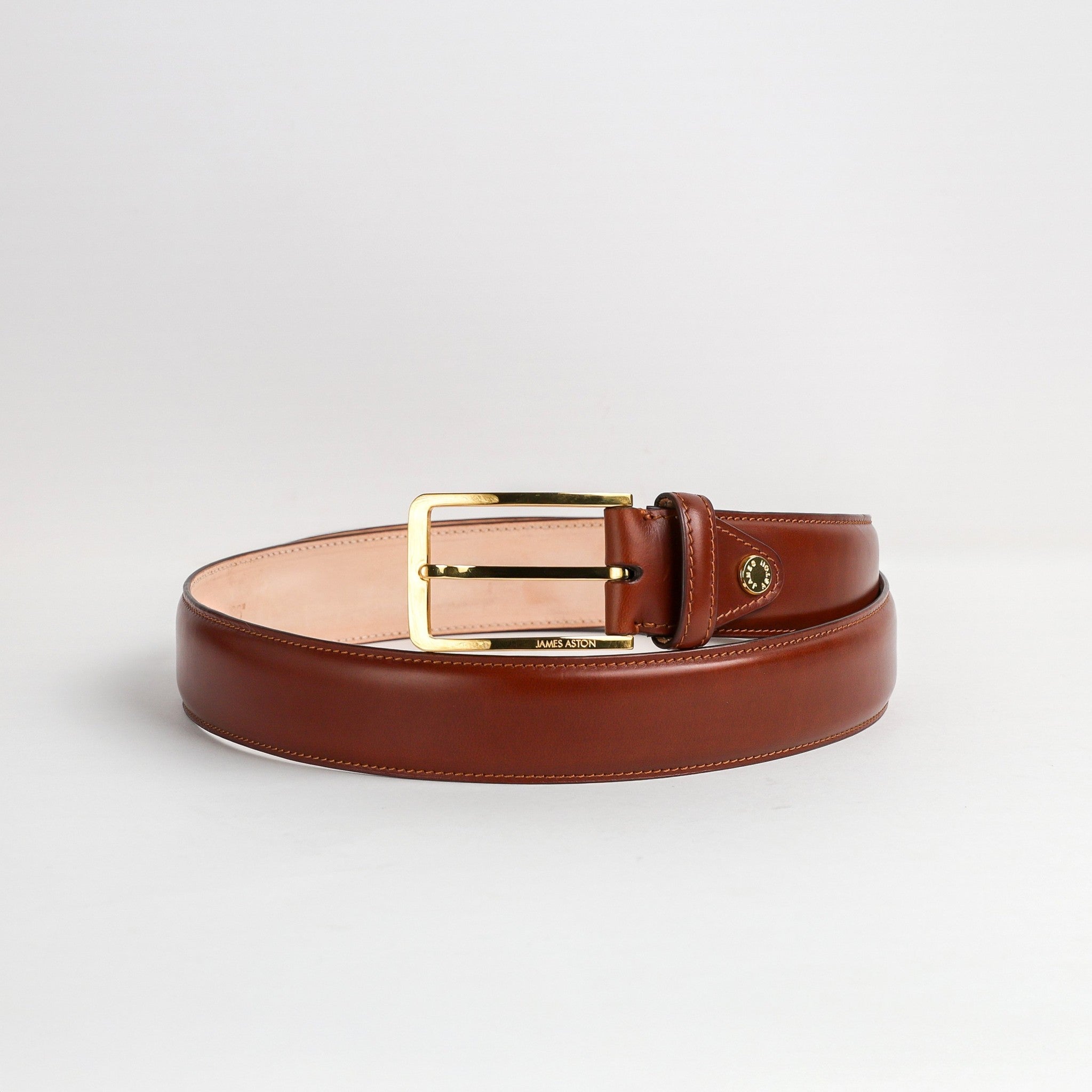 Gold buckle and keeper of The Lorenzo cognac Italian Bridle leather belt