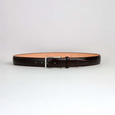 Full length of The Lorenzo dark brown Italian Bridle leather belt with nickel buckle, by James Aston