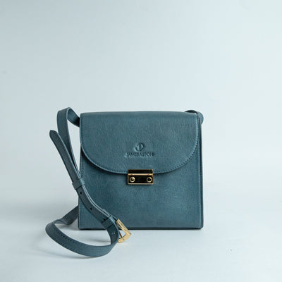 Ocean's Bloom Spanish vegetable tanned nubuck leather handbag in blue, by James Aston