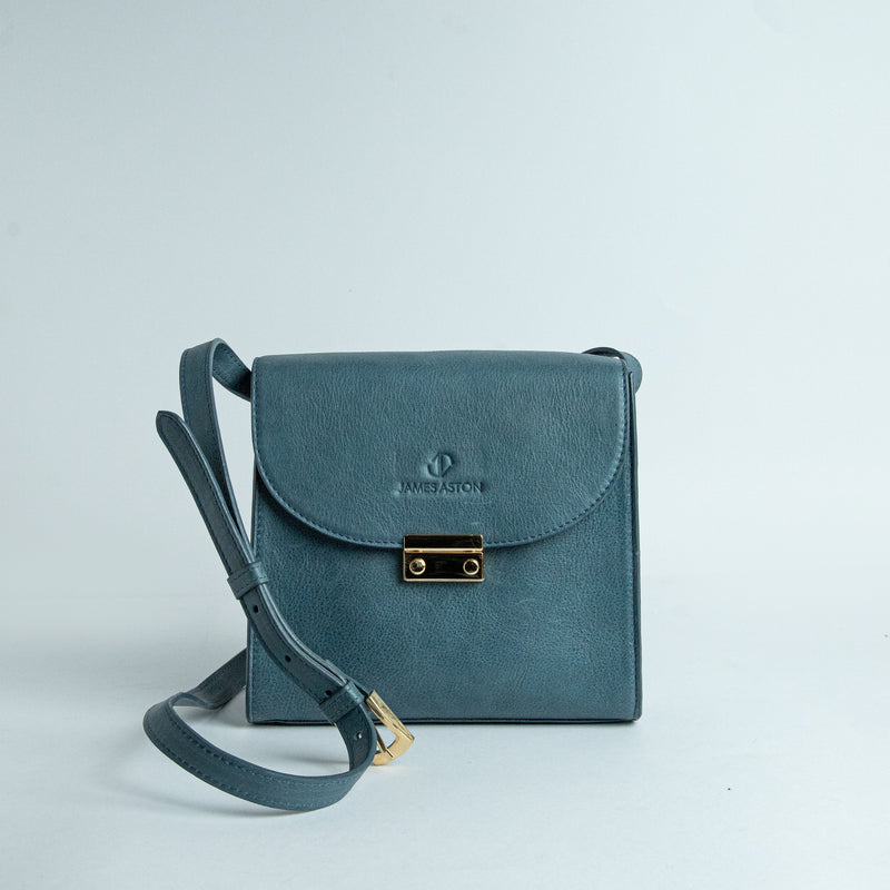Ocean's Bloom Spanish vegetable tanned nubuck leather handbag in blue, by James Aston