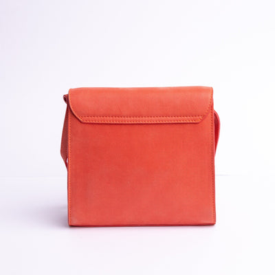 The back of Ocean's Bloom orange peach leather handbag.