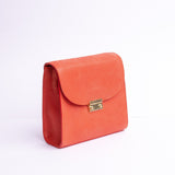 Ocean's Bloom orange peach Spanish nubuck leather handbag, full view.