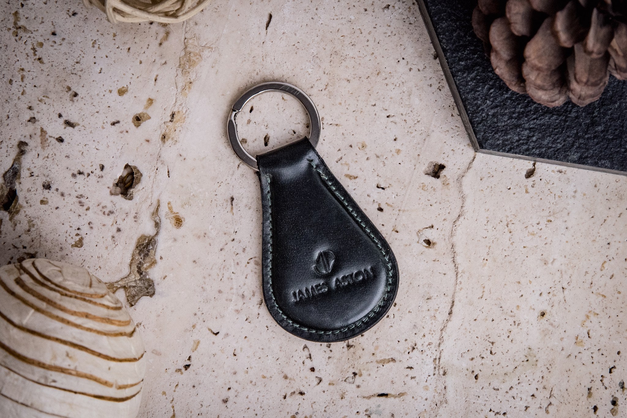 The Somerset key holder in bottle green English Bridle leather, composed.
