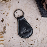 The Somerset key holder in bottle green English Bridle leather, composed.