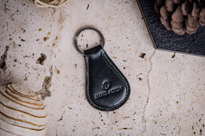 The Somerset key holder in bottle green English Bridle leather, composed.