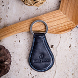The Somerset key holder in navy blue English Bridle leather, composed.