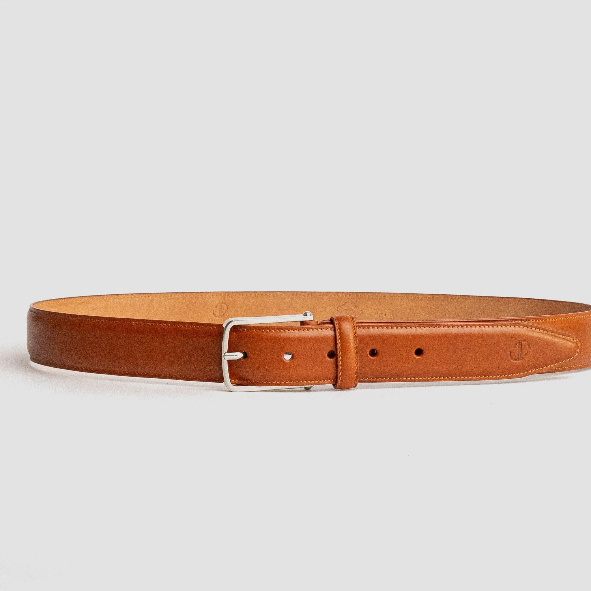 Close detail of the slightly raised full grain leather of The Amadeo in tan, by James Aston