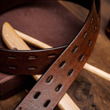 Detail of the cognac Spanish full grain milled leather of the Damian belt