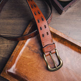 Detail of the tan Spanish full grain milled leather of the Damian belt