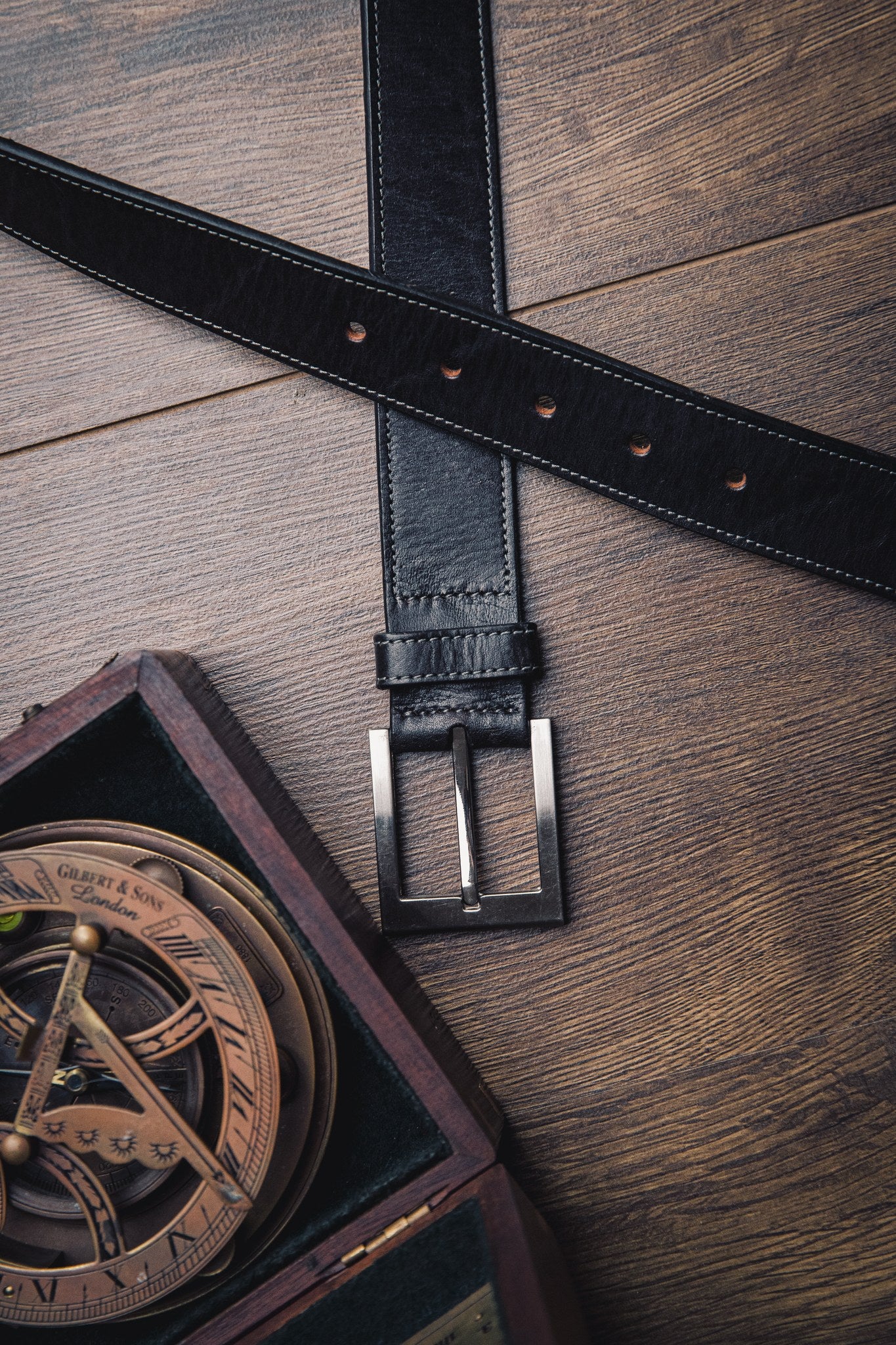 The Eduardo in Black, Spanish full grain milled leather belt, composed still life