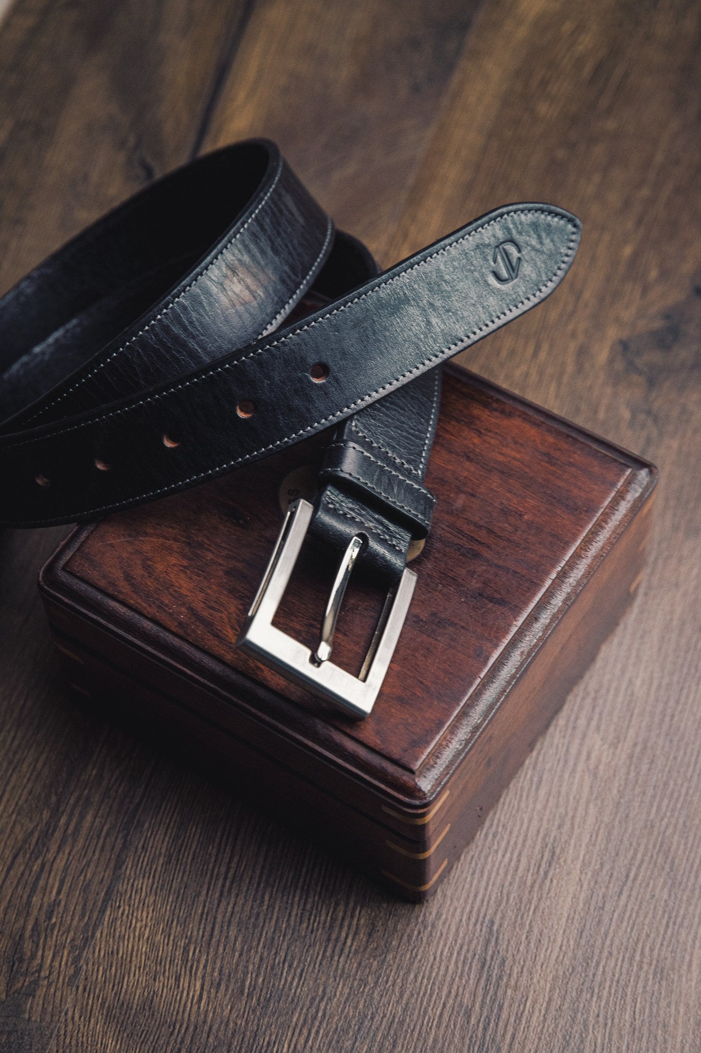 The Eduardo in Black, machine stitched edges with buckle fastened by hand stitching