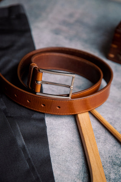 The Eduardo in Tan, Spanish full grain milled leather belt, composed still life