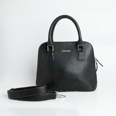 Close view of the black Spanish full grain milled leather and stitching on The Executive Handbag.