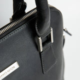 Brushed nickel metalware and YKK zip on The Executive Handbag.