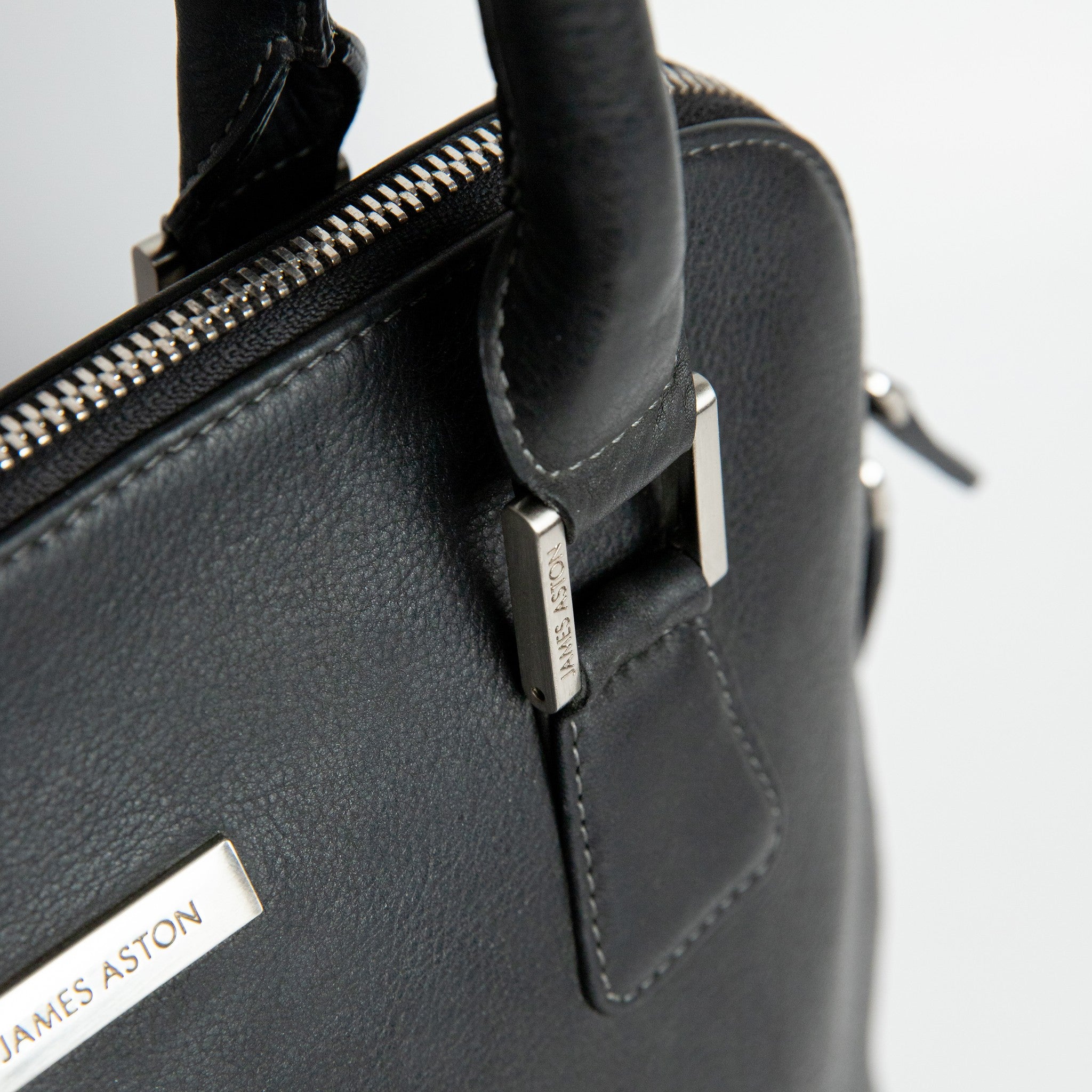 Brushed nickel metalware and YKK zip on The Executive Handbag.