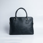 The back of The Executive Laptop Bag in black leather.
