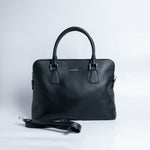 Close view of the black Spanish milled leather and stitching on The Executive Laptop Bag.