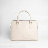 The back of The Executive Laptop Bag in off-white leather.