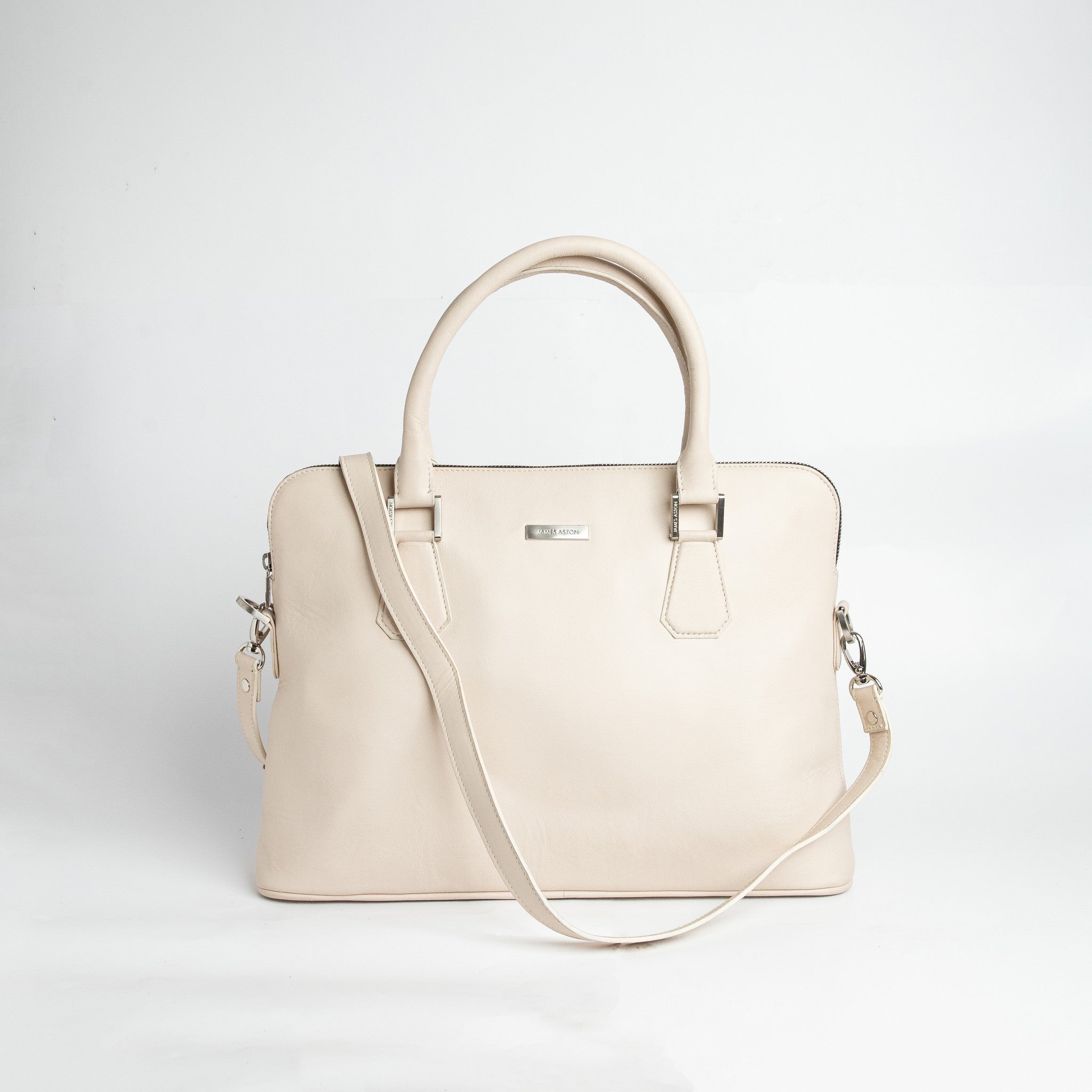 Close view of the off-white Spanish milled leather and stitching on The Executive Laptop Bag.