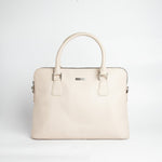 The Executive Laptop Bag in off-white Spanish milled leather, front view.