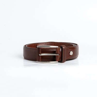 Close view of the brushed nickel buckle and solid brass screw on the Federico belt in Australian Nut