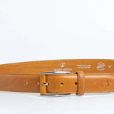 The Federico belt in tan Italian Full Grain Vachetta leather shown at full length, with brushed nickel buckle