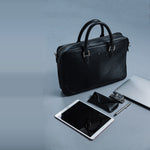 The Mentor mounted on a wheeled case by its back sleeve, ready for the day's travel.