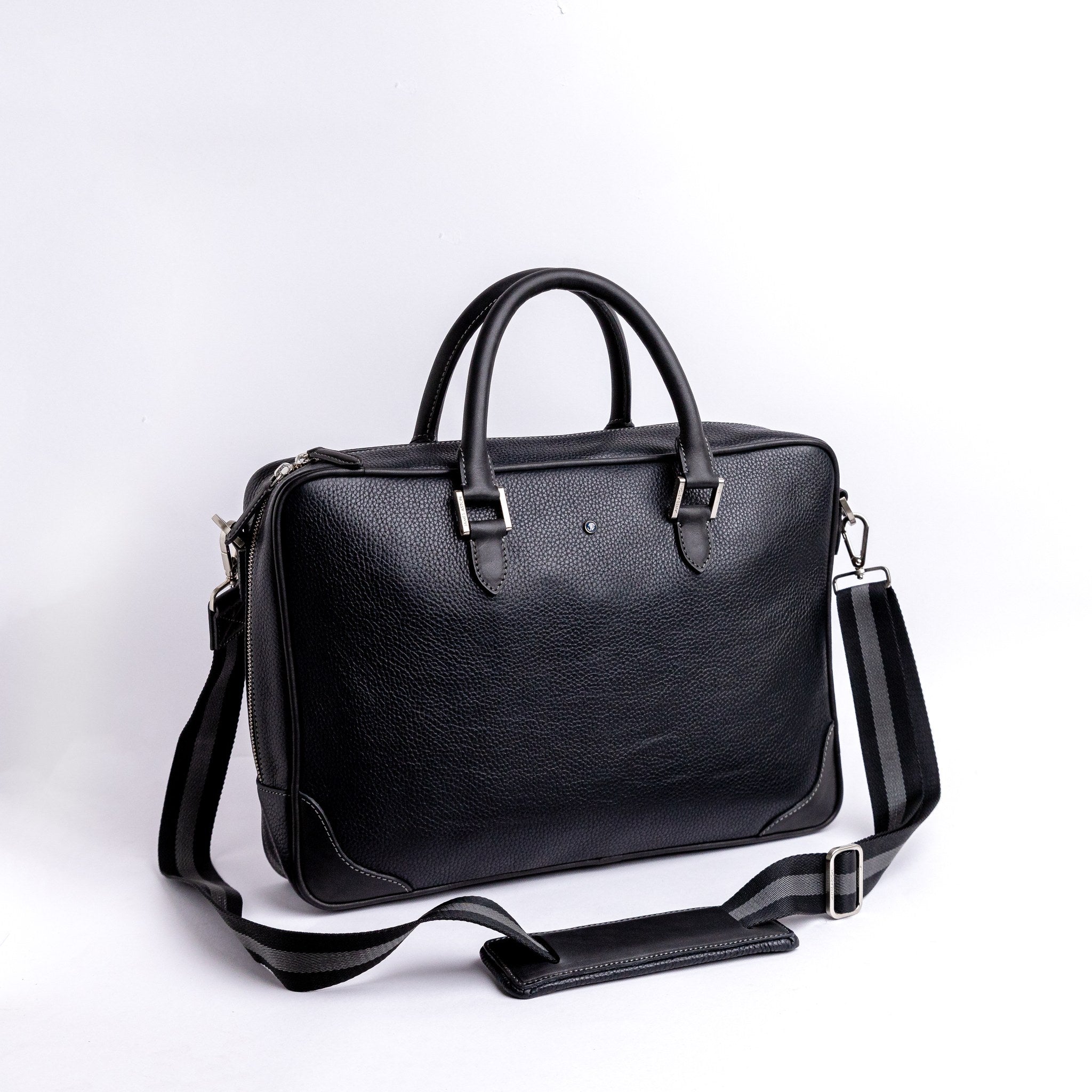 Stitching and full grain leather trim detail on The Mentor black laptop bag.