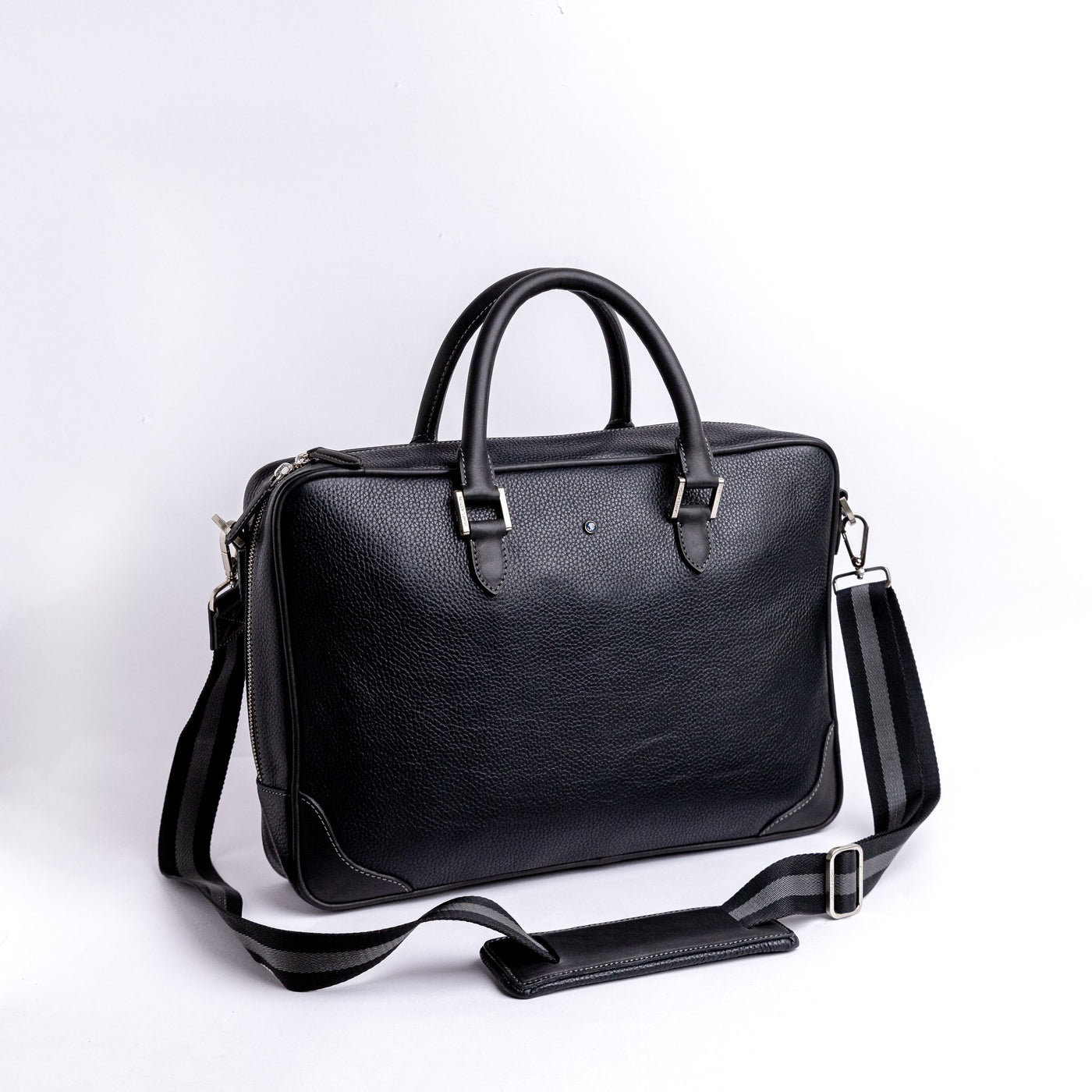 Stitching and full grain leather trim detail on The Mentor black laptop bag.