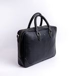 The Mentor black leather laptop bag, full form showing the rolled handles and structure.