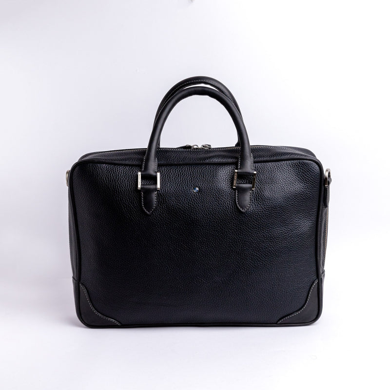 The Mentor laptop bag in black Spanish full grain vegetable tanned pebbled leather, by James Aston