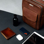 The Minimal Sling in cognac, carried light for the day.